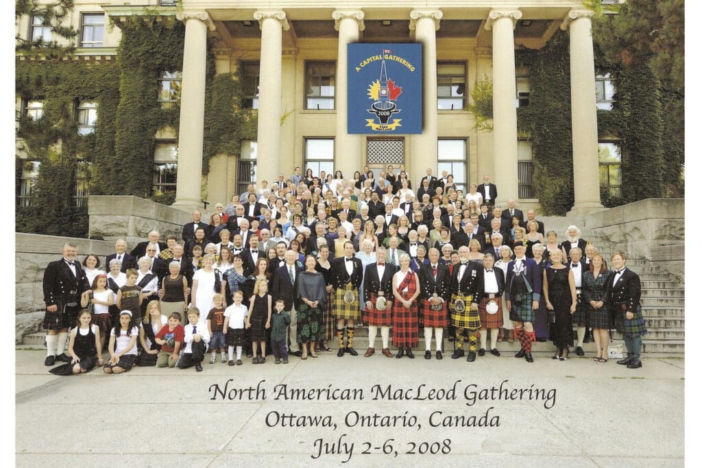 A large group of people standing in front of a building.